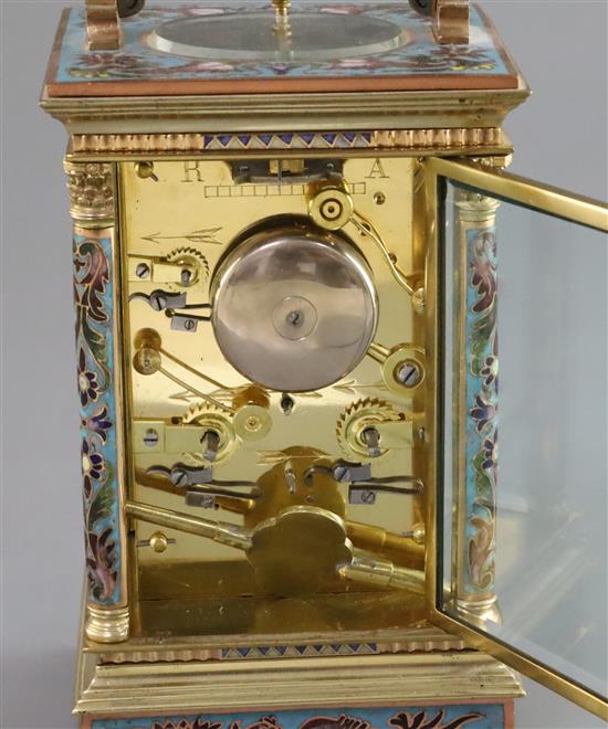 An early 20th century French ormolu and champleve enamel hour repeating carriage alarum clock, height 7.5in.